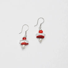 Silver hook earrings with red beads, clear oval beads, and small white pearl accents